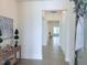 Bright entryway showcasing light wood floors and neutral paint creates a welcoming atmosphere at 244 Bevis Marks Dr, Fuquay Varina, NC 27526