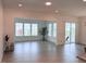 Spacious living room featuring hardwood floors, recessed lighting, and natural light at 244 Bevis Marks Dr, Fuquay Varina, NC 27526