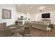 Open concept living space combining the kitchen, dining room and living room for a modern comfortable vibe at 244 Bevis Marks Dr, Fuquay Varina, NC 27526