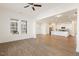 Open-concept living space boasting hardwood floors, neutral walls, recessed lighting, and eat in kitchen at 244 Bevis Marks Dr, Fuquay Varina, NC 27526