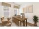 This staged office features stylish decor, natural light, and ample work space at 244 Bevis Marks Dr, Fuquay Varina, NC 27526