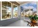 Covered patio with open door leading to view of other homes and backyards at 244 Bevis Marks Dr, Fuquay Varina, NC 27526