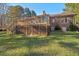 View of the backyard and the deck connected to the house at 2520 Summit Ln, Creedmoor, NC 27522