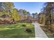 Traditional brick home with two-car garage and well manicured lawn and garden at 2520 Summit Ln, Creedmoor, NC 27522