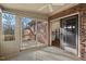 A screened-in porch offering views of the exterior deck and providing access to the interior of the home at 2520 Summit Ln, Creedmoor, NC 27522