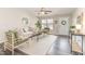 Bright living room features stylish furniture, a ceiling fan, and a welcoming entryway at 2815 E Brookwood Ct, Creedmoor, NC 27522