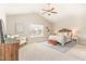 Large main bedroom featuring vaulted ceiling, plush carpet, and ceiling fan at 2815 E Brookwood Ct, Creedmoor, NC 27522