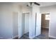 Bedroom features a ceiling fan, closet, and neutral walls with wood-look flooring at 2918 Kanewood Dr, Durham, NC 27707