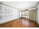 Spacious bedroom features hardwood floors, neutral walls, and natural light from the window at 3074 Granville Dr, Raleigh, NC 27609