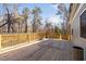 Expansive back deck with wooden rails, perfect for outdoor entertaining at 318 Holland Glen St, Fuquay Varina, NC 27526