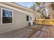 Large wooden deck extending from the home, perfect for outdoor living and entertaining, with easy backyard access at 318 Holland Glen St, Fuquay Varina, NC 27526