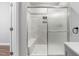 Bathroom featuring updated shower, new floors and fresh paint at 318 Holland Glen St, Fuquay Varina, NC 27526