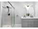 Bathroom boasts double sink vanity, updated fixtures, fresh paint and updated shower at 318 Holland Glen St, Fuquay Varina, NC 27526