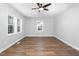 Bedroom featuring natural light, fresh paint, new floors and baseboards at 318 Holland Glen St, Fuquay Varina, NC 27526