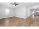 This living room features recessed lights, new floors, fresh paint and easy access to the kitchen at 318 Holland Glen St, Fuquay Varina, NC 27526