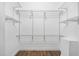 A spacious walk-in closet provides plenty of storage for clothes and shoes at 318 Holland Glen St, Fuquay Varina, NC 27526