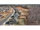 Aerial view showcases a neighborhood with homes featuring well-maintained lawns at 40 Glendavis Hollow Dr, Franklinton, NC 27525