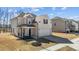 Two-story home with manicured front lawn, a two-car garage, and inviting curb appeal at 40 Glendavis Hollow Dr, Franklinton, NC 27525