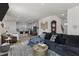 Open-concept living area that connects seamlessly to the modern kitchen and features hardwood flooring at 40 Glendavis Hollow Dr, Franklinton, NC 27525