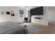 Main bedroom featuring a TV, carpet, and natural light from a window at 40 Glendavis Hollow Dr, Franklinton, NC 27525