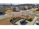 A wide angle view of a street corner with charming homes and community mailboxes under a brilliant blue sky at 40 Glendavis Hollow Dr, Franklinton, NC 27525