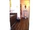 Bathroom with a granite countertop sink and dark wood cabinets at 4408 Leota Dr, Raleigh, NC 27603