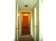 The hallway is brightly lit and is well-suited to provide access to several rooms at 4408 Leota Dr, Raleigh, NC 27603