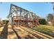 Spacious home features a wooden deck, screened porch, and beautifully landscaped backyard at 504 Crooked Pine Dr, Cary, NC 27519