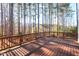 Exterior shot of deck overlooking a yard with trees at 504 Crooked Pine Dr, Cary, NC 27519