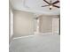 Open bedroom showing ceiling fan, neutral paint color, and windows at 504 Crooked Pine Dr, Cary, NC 27519