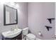 Well-maintained powder room with modern fixtures and stylish decor at 504 Crooked Pine Dr, Cary, NC 27519
