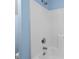 Close up of a standing shower with blue walls and chrome fixtures at 504 Crooked Pine Dr, Cary, NC 27519