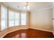 Bright breakfast nook with hardwood floors and large windows offering plenty of natural light at 5129 Chasteal Trl, Raleigh, NC 27610