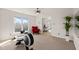 Bonus room featuring an exercise machine and sitting area at 523 Patrick Rd, Bahama, NC 27503