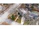 Aerial view features this home in an established neighborhood, a lovely yard, and mature trees at 5412 Farley Dr, Raleigh, NC 27609