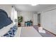 Bright bedroom featuring a large closet, hardwood floors, and an office area at 5412 Farley Dr, Raleigh, NC 27609