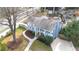 Charming home featuring a well-maintained yard, inviting walkway, and classic architectural details at 5412 Farley Dr, Raleigh, NC 27609