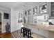 Modern kitchen with white cabinetry, stainless steel appliances, and stylish countertops at 5412 Farley Dr, Raleigh, NC 27609