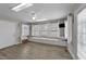 Inviting sunroom with bright light, tile flooring, and a built-in seating nook at 5412 Farley Dr, Raleigh, NC 27609