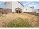 Backyard featuring a gentle slope, wood fence, and mature trees at 5439 Ripplebrook Rd, Durham, NC 27712