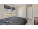 Bedroom featuring a view out the window and stylish dark grey window shades at 5439 Ripplebrook Rd, Durham, NC 27712