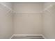 Walk-in closet with wire shelving, providing ample storage for clothes and accessories at 5439 Ripplebrook Rd, Durham, NC 27712