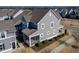 Aerial view showing the screened porch, yard, and surrounding neighborhood at 5501 Advancing Ave, Raleigh, NC 27616