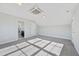 Spacious bedroom with ample natural light and neutral-toned carpet at 5501 Advancing Ave, Raleigh, NC 27616