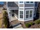 Inviting home featuring a covered front porch and manicured landscaping, enhancing curb appeal at 5501 Advancing Ave, Raleigh, NC 27616