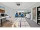 Modern office space furnished with stylish chairs and decor near a full bathroom at 5501 Advancing Ave, Raleigh, NC 27616