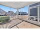 Cozy screened-in porch offers outdoor living space with neighborhood views at 5501 Advancing Ave, Raleigh, NC 27616