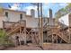 Back exterior view showcasing multi-level decks offering ample outdoor space for relaxation at 6036 Epping Forest Dr, Raleigh, NC 27613