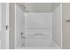 A clean white bathtub and shower area with a chrome faucet at 6036 Epping Forest Dr, Raleigh, NC 27613