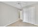 A plain bedroom featuring a window for natural light and a closet at 6036 Epping Forest Dr, Raleigh, NC 27613